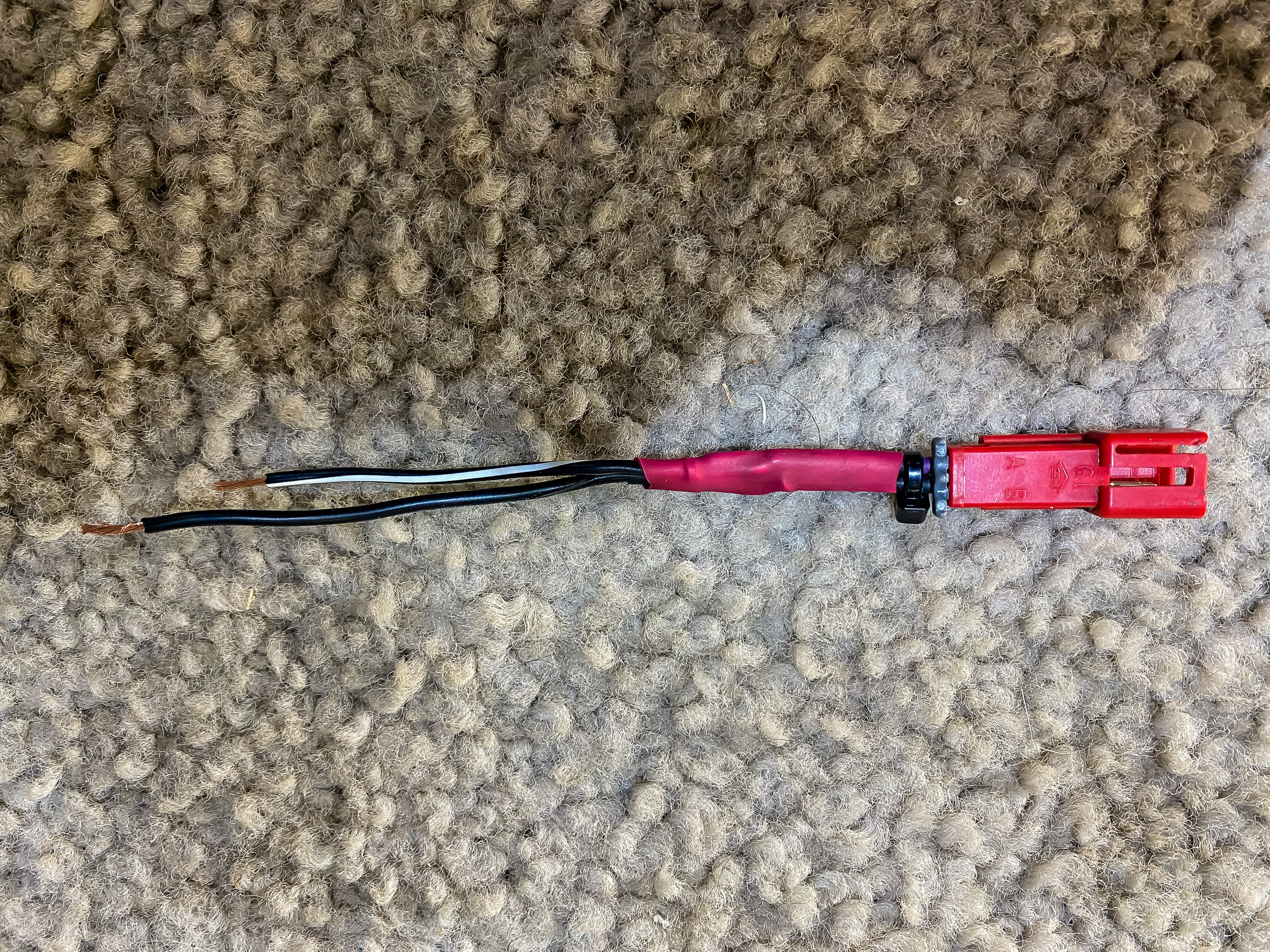 This is a connector I made for plugging in the Garmin GPS. The other side is soldered to the GPS power wire. This is not necessary.