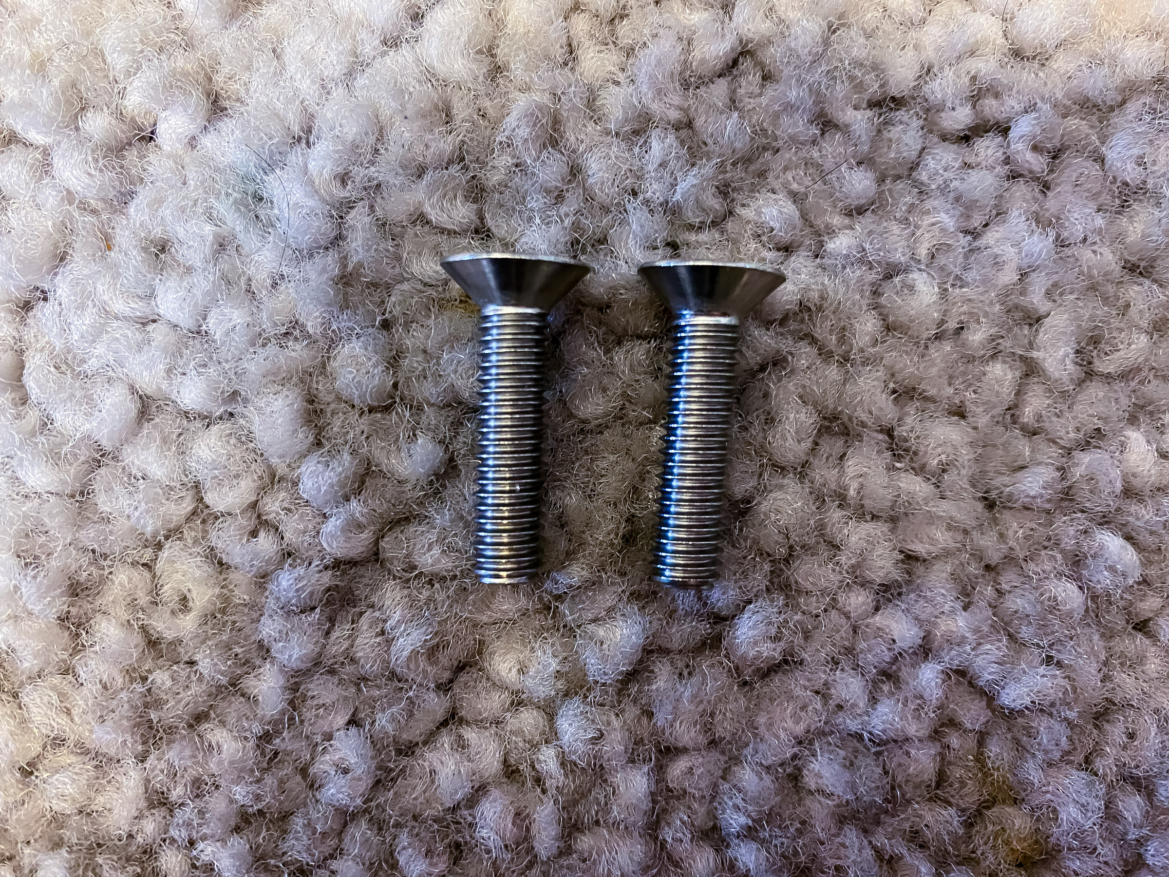 These are used for the standoff pins on the bottom of the Motech rack. They have to be short so they don't run into the lower rack struts.