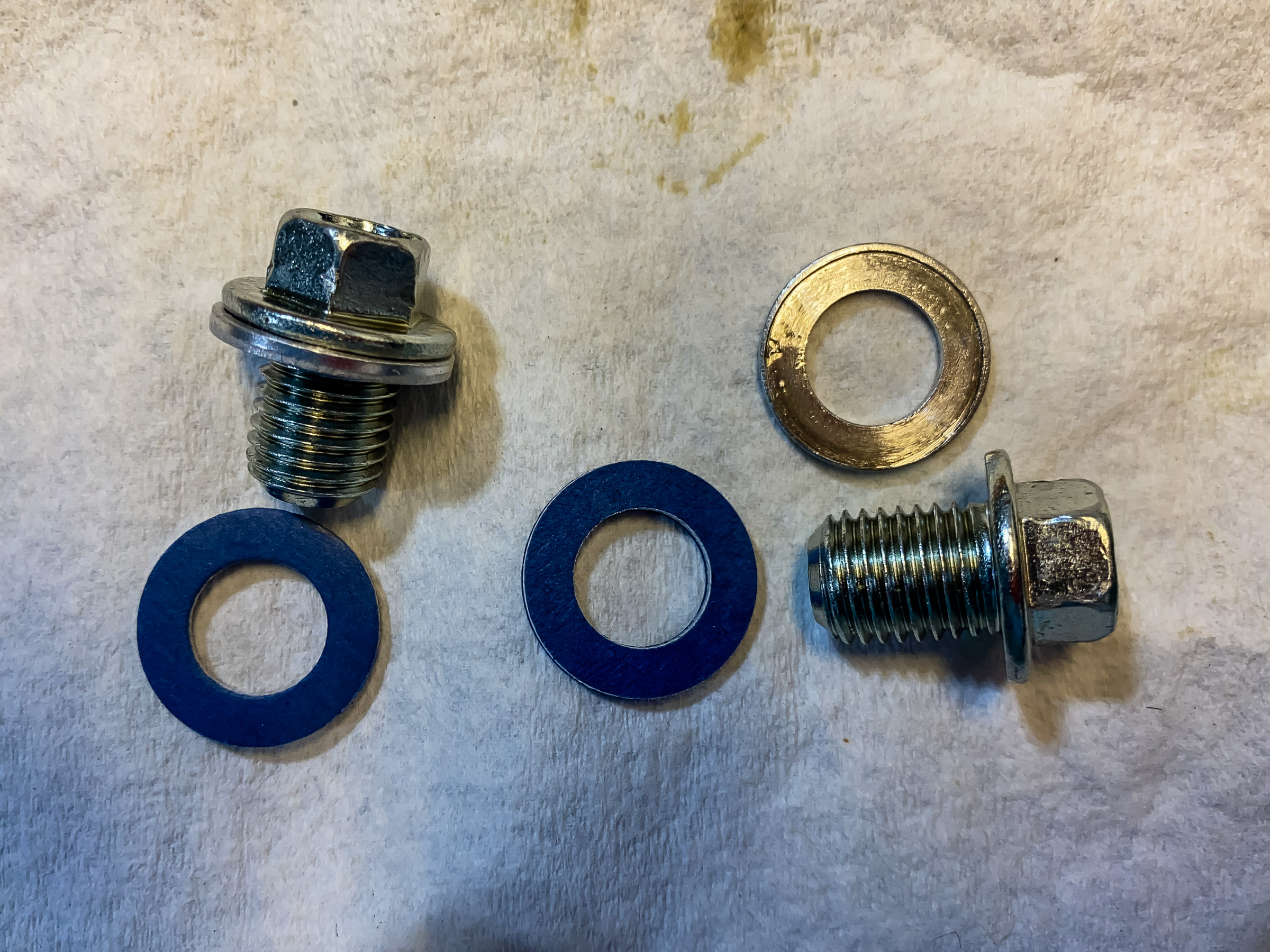 12mm crush washers to seal the oil drain plugs. The old one is on the top right.