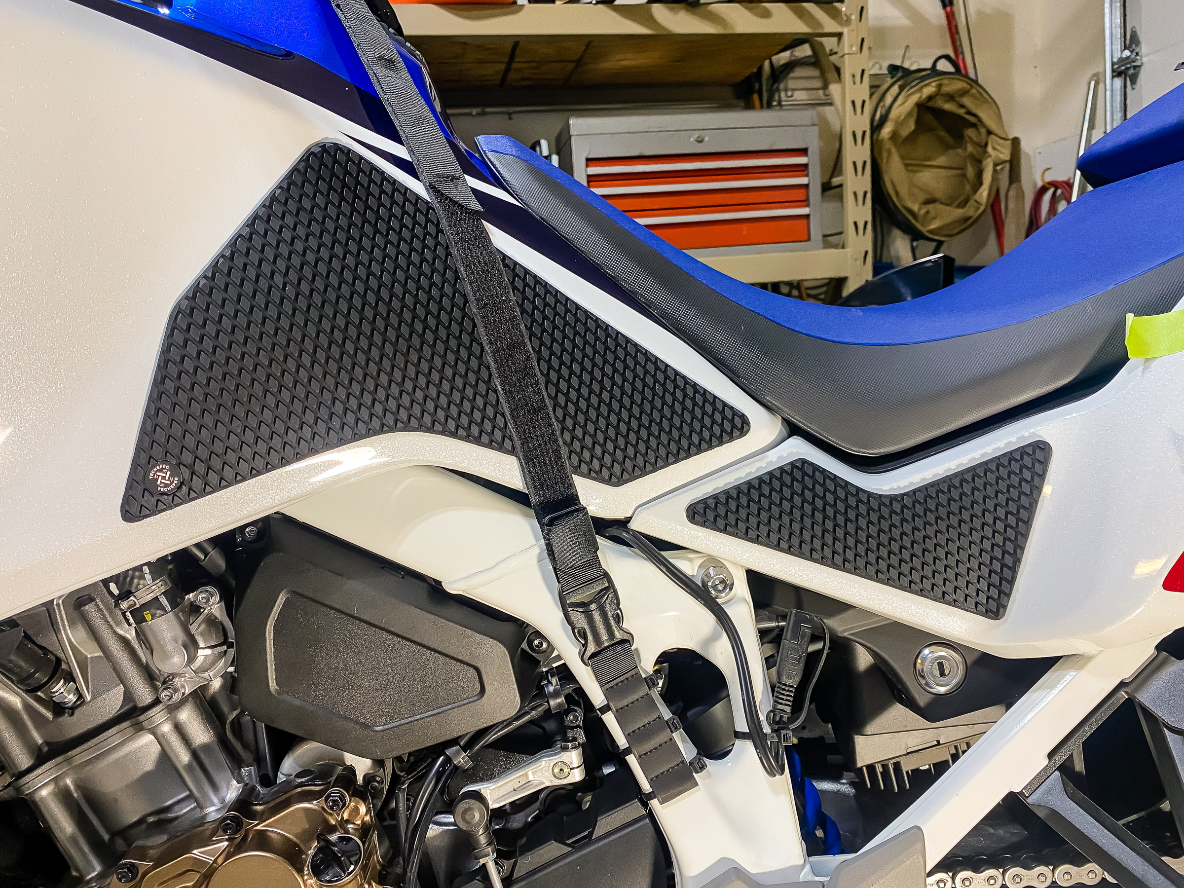 I wanted something to protect the tank from getting scratched. Techspec HONDA AFRICA TWIN ADVENTURE  (2020-Current) Snake Skin Tank Grips w/ Center Tank Protector SKU 62-2038-SS  2436 Precision Dr, STE 1, Minden, NV 89423 95.00