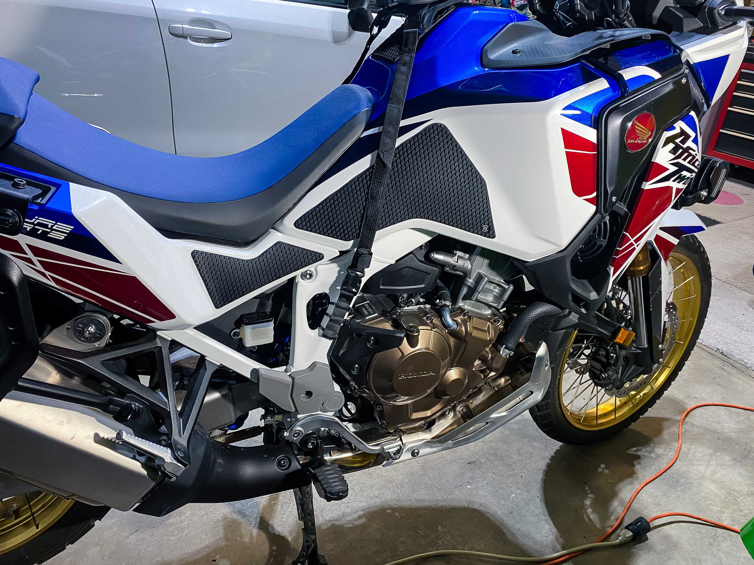 I wanted something to protect the tank from getting scratched. Techspec HONDA AFRICA TWIN ADVENTURE  (2020-Current) Snake Skin Tank Grips w/ Center Tank Protector SKU 62-2038-SS  2436 Precision Dr, STE 1, Minden, NV 89423 95.00