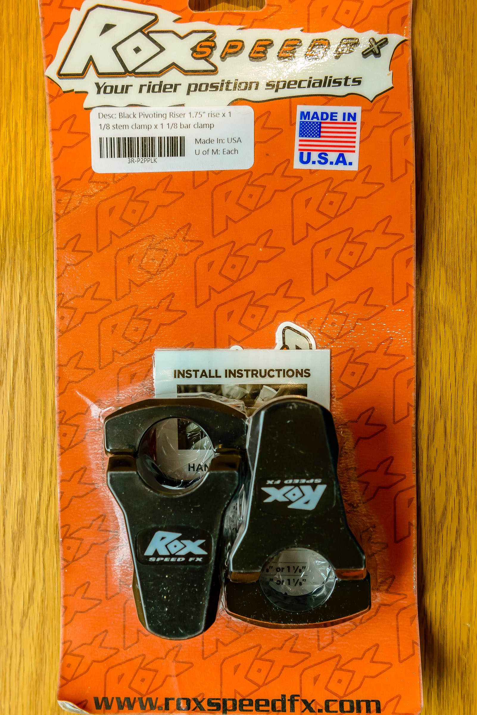 Rox 1-3/4" pivoting / kickback handlebar risers for 1-1/8" handlebar and 1-1/8 stem. Part No 3R-P2PPLK.  Be aware that the tank bag may not fit with the handlebars moved back.