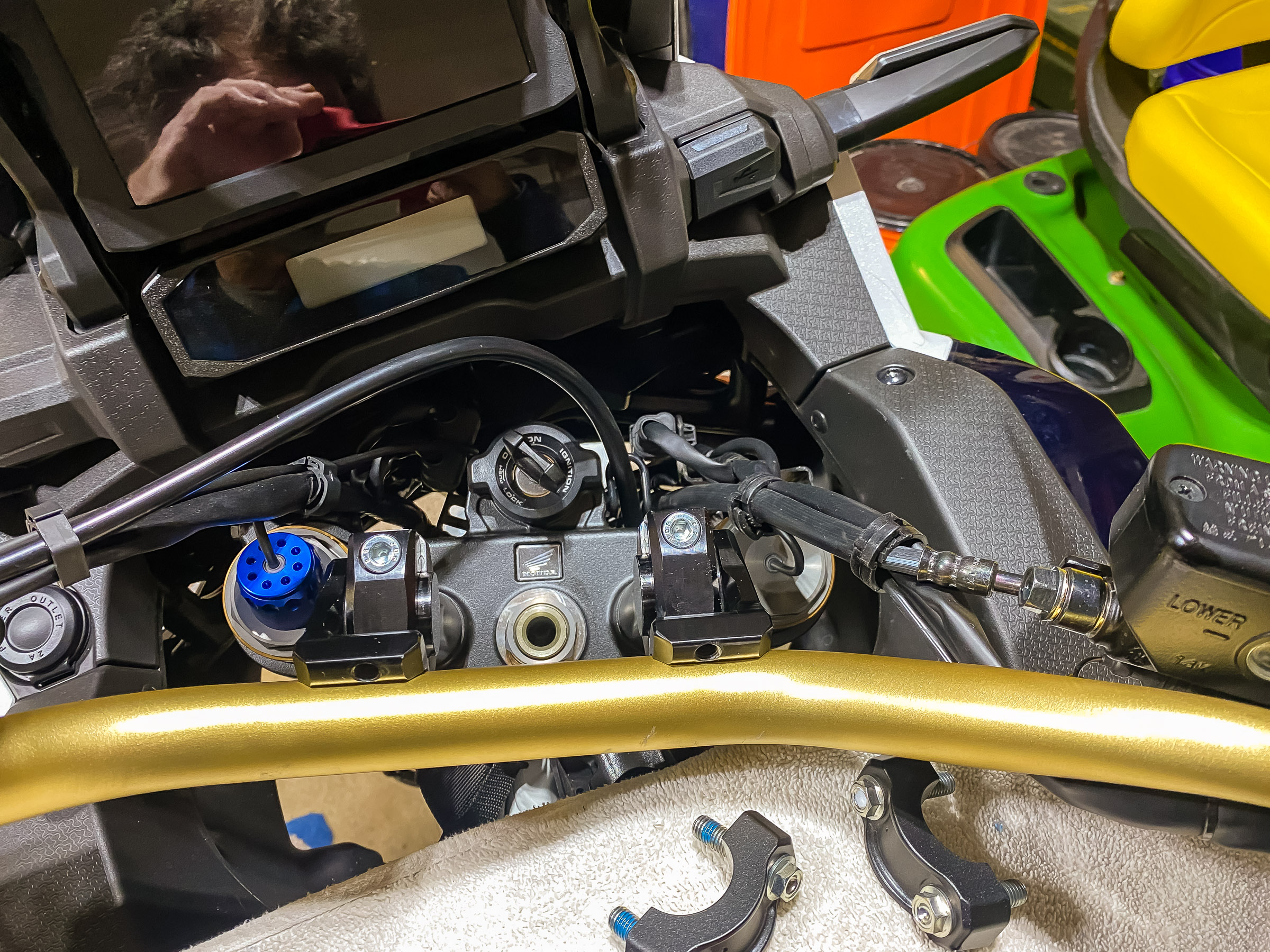 Place the handlebar on the ROX riser and position it where you want it. This entails rotating the risers on the shafts. This picture is showing the incorrect clamps in the lower position.