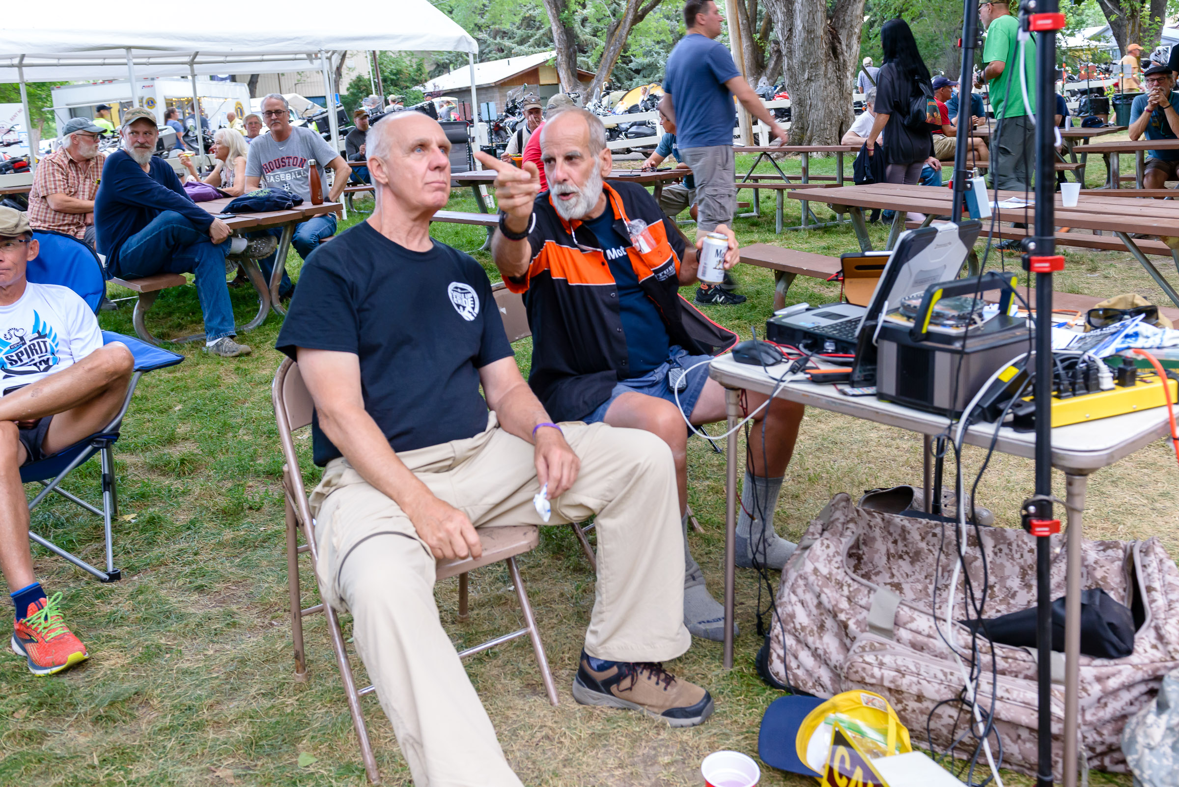 Carl and Barrett Palumbo discussing the laser show before Ally Venable comes on.