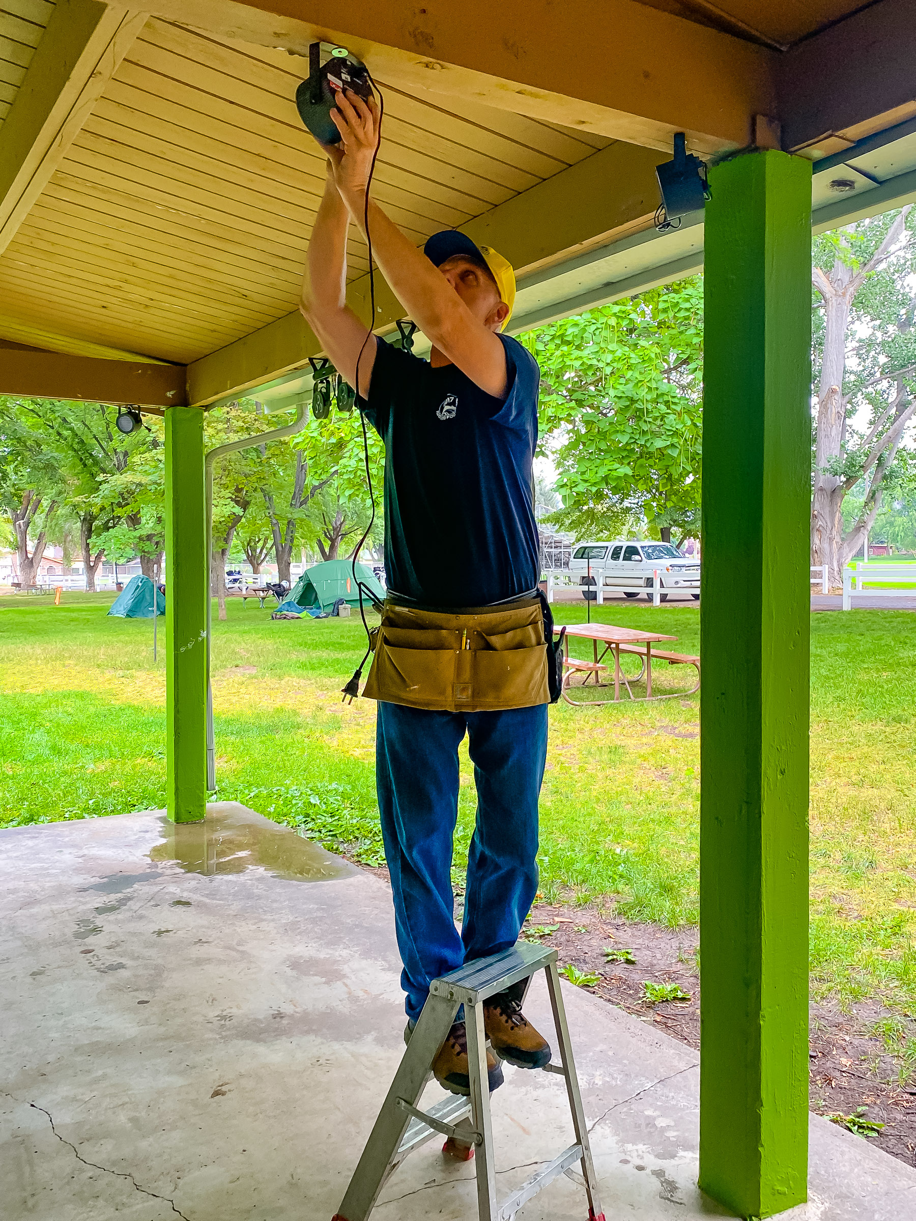 Carl putting up the stage lighting.