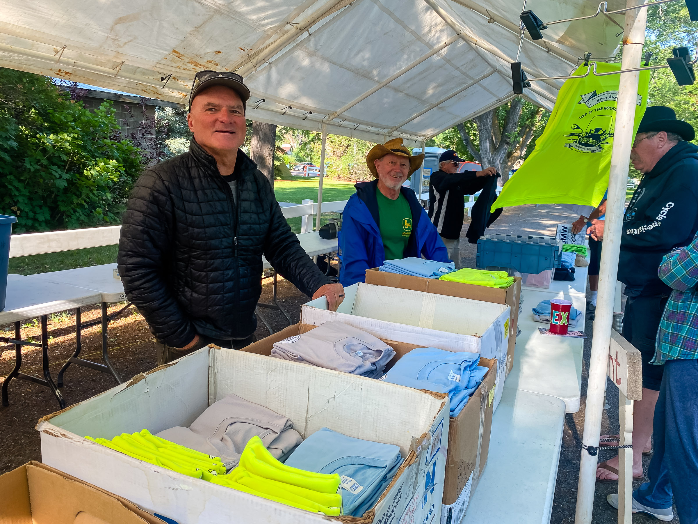 Tom and Siggy selling Tshirts.